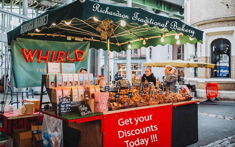 Highstreet sales campaign under a green canopy on the street