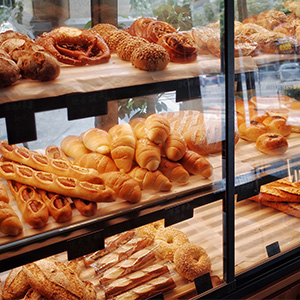Stores products in a glassed shelved showcase